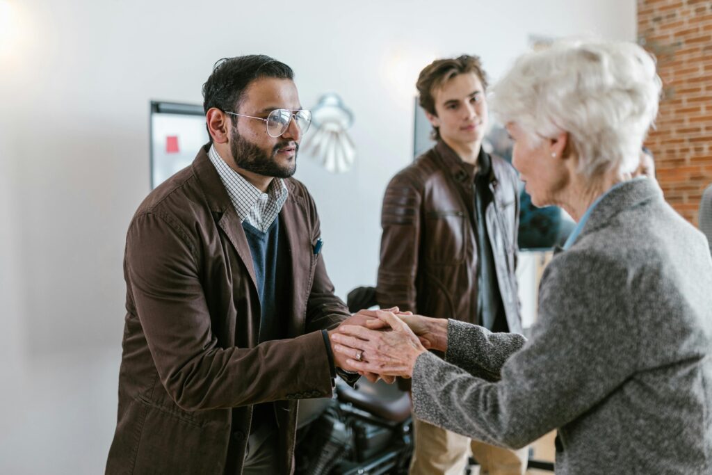 sales and marketing people giving first impressions